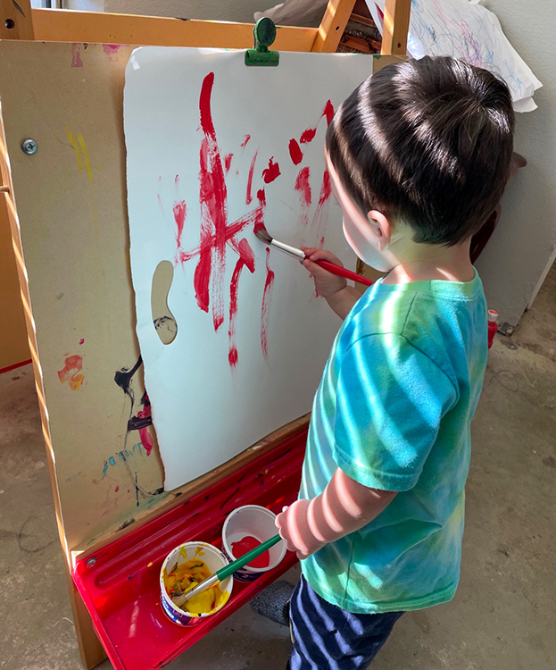 child painting at an FFN provider
