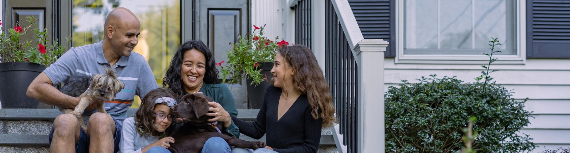 Family sitting on stoop